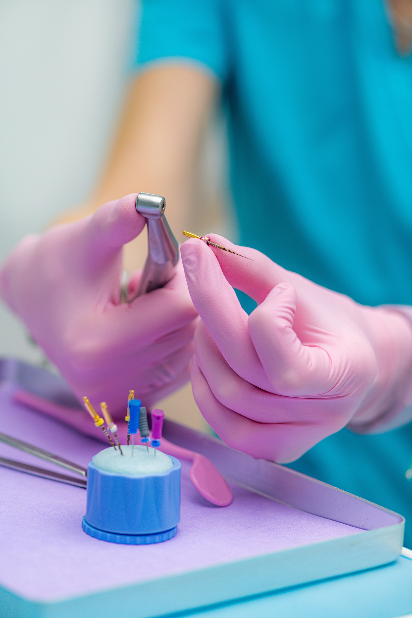 Endodontist with Glidden Drill, Root Canal Treatment.